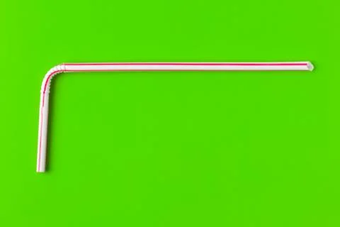 Tubes for drinks on a green background macro. place for the label 写真素材