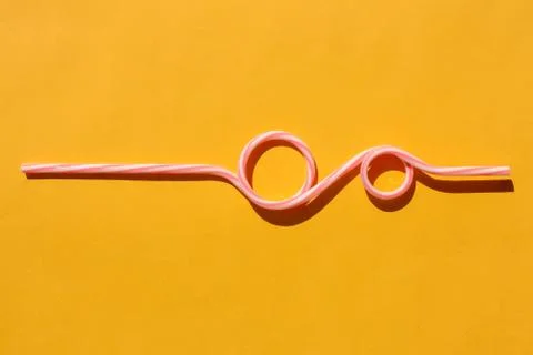 Tubes for drinks on a yellow background macro. place for the label 스톡 사진