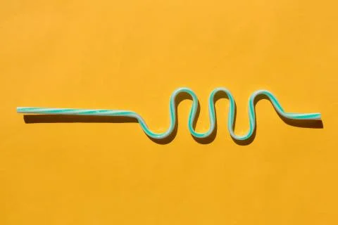 Tubes for drinks on a yellow background macro. place for the label Stock-Fotos