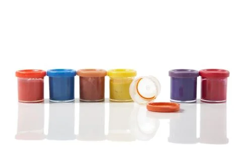 Tubes with a paint on  white background Stock Photos