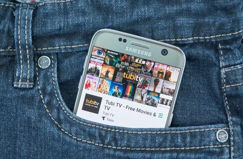 Tubi TV mobile application on screen of Samsung Stock Photos