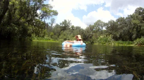 Tubing Down River Stock Footage 25002246
