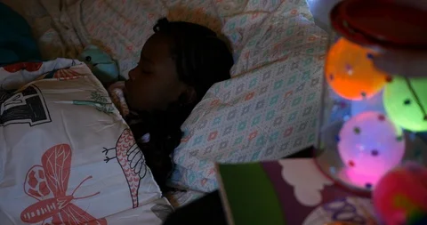 Tucking Child in at Bedtime Stock Footage 91271804