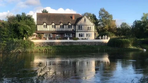 Tudor House by the river Stock Footage 117548979