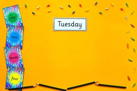 Tuesday learning flatlay. Stock Photos