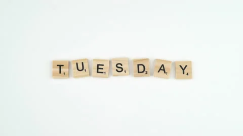 Tuesday Written In Scrabble Blocks. 4k Shot Of Hand Placing Wooden Game Stock Footage 156364755