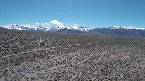 Tufas in Mono Lake with the Eastern Sierra Mountains in the Background Stock Footage 79838009