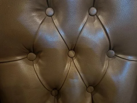 Tufted Leather Upholstery Texture with Button Details in Luxury Furniture De Stock Photos