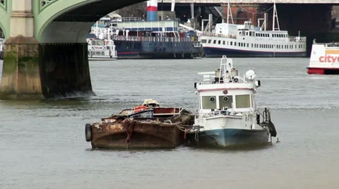 Tug and barge on river thames england Stock Footage 36780654