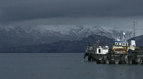 Tug and CISPRI Responder Barge Moving Away from Dock Stock Footage 12364281