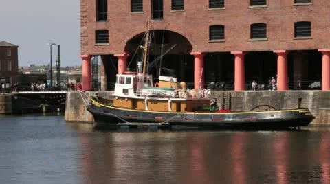 Tug boat in Albert Dock, Liverpool Stock Footage