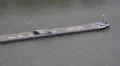 Tug Boat Loaded Sand Cement Rock Material Industrial Cargo Ship Passing River HD Footage