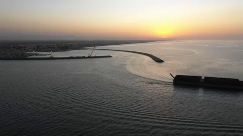 Tug Boat Pulling Barge during Sunset Stock Footage 118494434