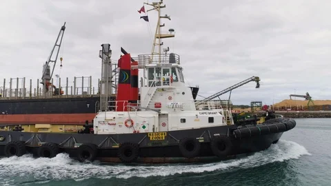 Tug boat returning to its berth - Portland Victoria, Australia. Stock Footage 93284336
