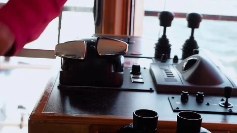 Tug master controls motors. Close-up of hands in a low light Stock Footage 71991544
