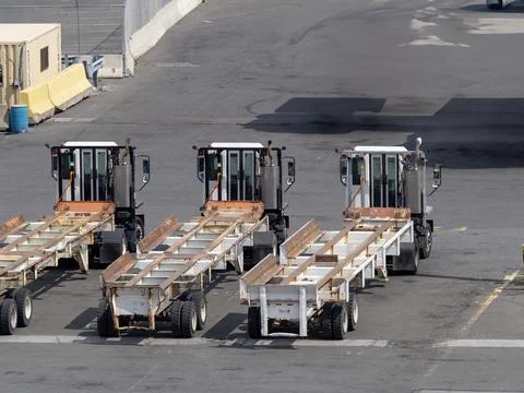 Tug master ready for load container in the harbour of new york Stock Photos