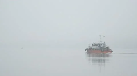 Tug is on the misty river. Stock Footage 46138473