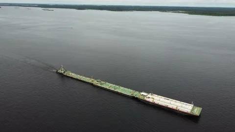 A tug push ferry boats through Negro river, Amazon, Brazil 4K Stock Footage 155511770