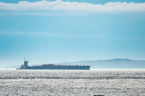 Tug pushing barge through Buzzards Bay Stock Photos