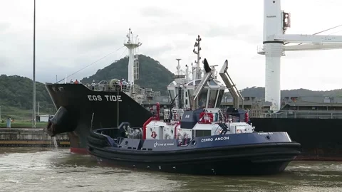Tug Ship Serves Cargo In Chamber Of Canal Panama 4k Stock Footage 196884328
