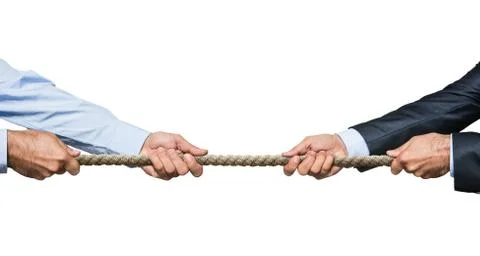 Tug war, two businessman pulling a rope in opposite directions Stock Photos