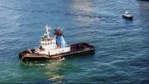 Tug working with general cargo ship. Stock Footage 112624575