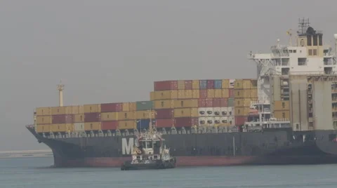 Tugboat Assisting Container Cargo Ship Stock Footage 63086546