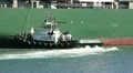 Tugboat Assists Container Ship For Mooring HD Footage