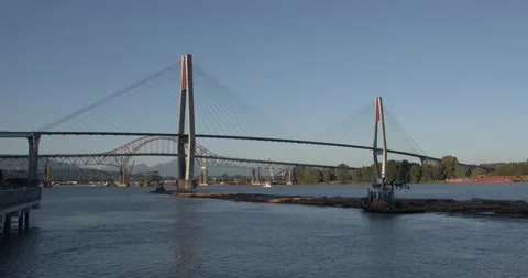 Tugboat carrying logs Stock-Footage 157900236