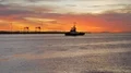 Tugboat in Channel At Sunrise 4k or 4k+ Resolution