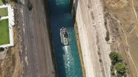 Tugboat in Corinth Canal top-down drone view Greece Stock Footage 336490106