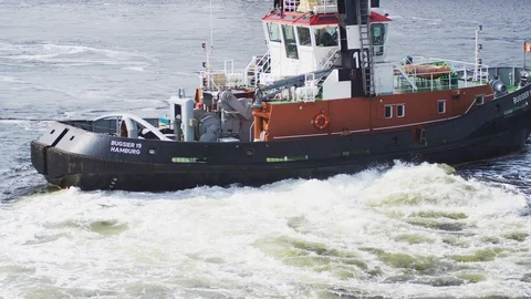 Tugboat with full Power Ahead pulling in 6k Stock Footage 96296904