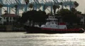 Tugboat In Harbor at Sunrise HD Footage