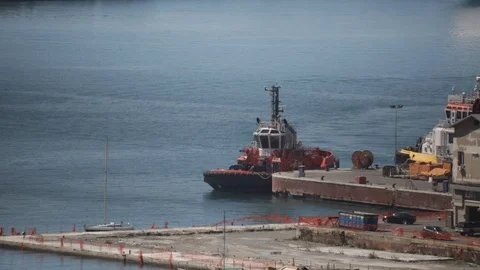 Tugboat moored at the pier Stock Footage 126893038
