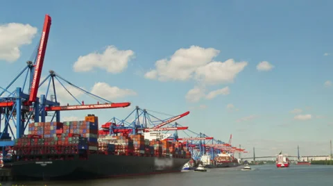 Tugboat pulling container ship - Time lapse Stock Footage 39593645