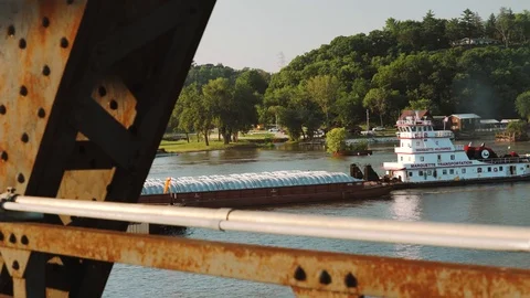 Tugboat pushes garbage down a river Video stock 121551100