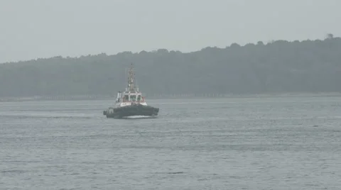 Tugboat Returning To Port Stock Footage 65332439