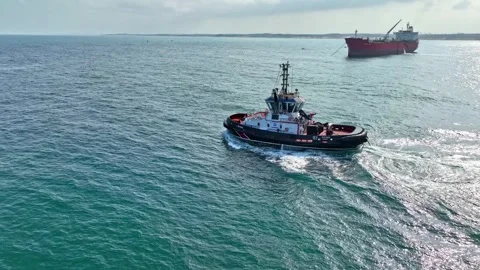 Tugboat sailing in the open sea Stock Footage 294067121
