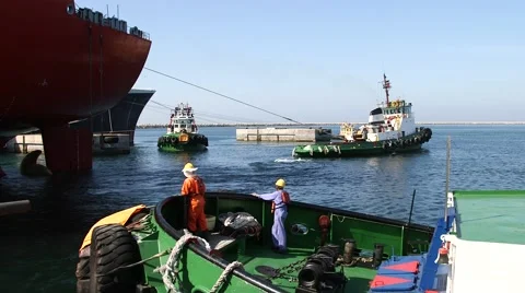Tugboats Working In The Harbor Stock Footage 63988551