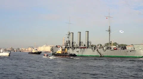 Tugs pulled the ship Aurora for the restoration of the river Neva Video stock 46825972