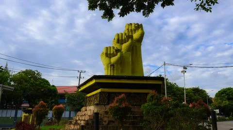 "Tugu Pemuda" is located right at the intersection of Gunung Pasir street Stock Photos