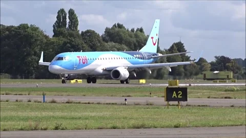 TUI Belgium Embraer E190 Close-Up Arrival at Small/Regional Airport Stock Footage 240295987