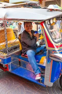 Tuk tuk driver wait for client Stock Photos