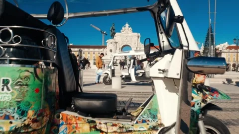 Tuk Tuk at Praca do Comercio, also known as Terreiro do Paco, Lisbon Stock Footage 263158198