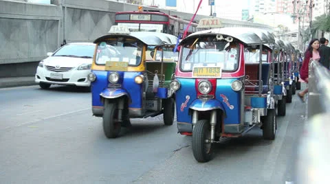 Tuk Tuk taxi in Bangkok Stock Footage