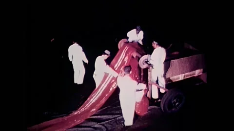 TULAROSA - 1960 - Scientists roll out Captain Joseph Kittinger's parachute Stock Footage 304057042