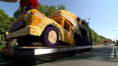 Tulipman flowers car during the flower parade in Lisse, Netherlands Stock Footage