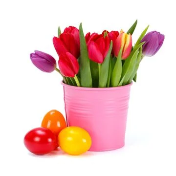 Tulips and painted easter eggs Stock Photos