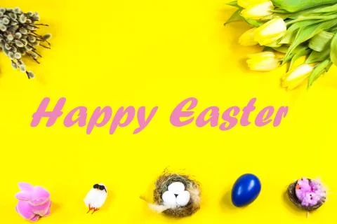 Tulips, Easter egg, Easter basket on yellow background, palm kitten Stock Photos