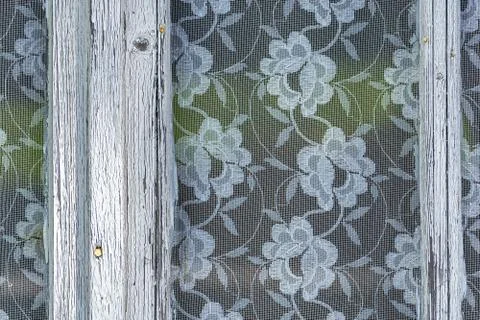 Tulle on the window. Stock Photos